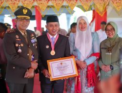 Bupati Solok Terima Penghargaan pada Peringatan HUT TNI ke-80